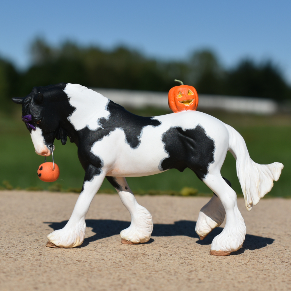 CM Breyer by Sarah Tregay, a Custom Mini/ Stablemate Model Horse to black and white pinto drum horse with purble bow and jack-o-lantern, a Halloween decorator Breyer Stablmate
