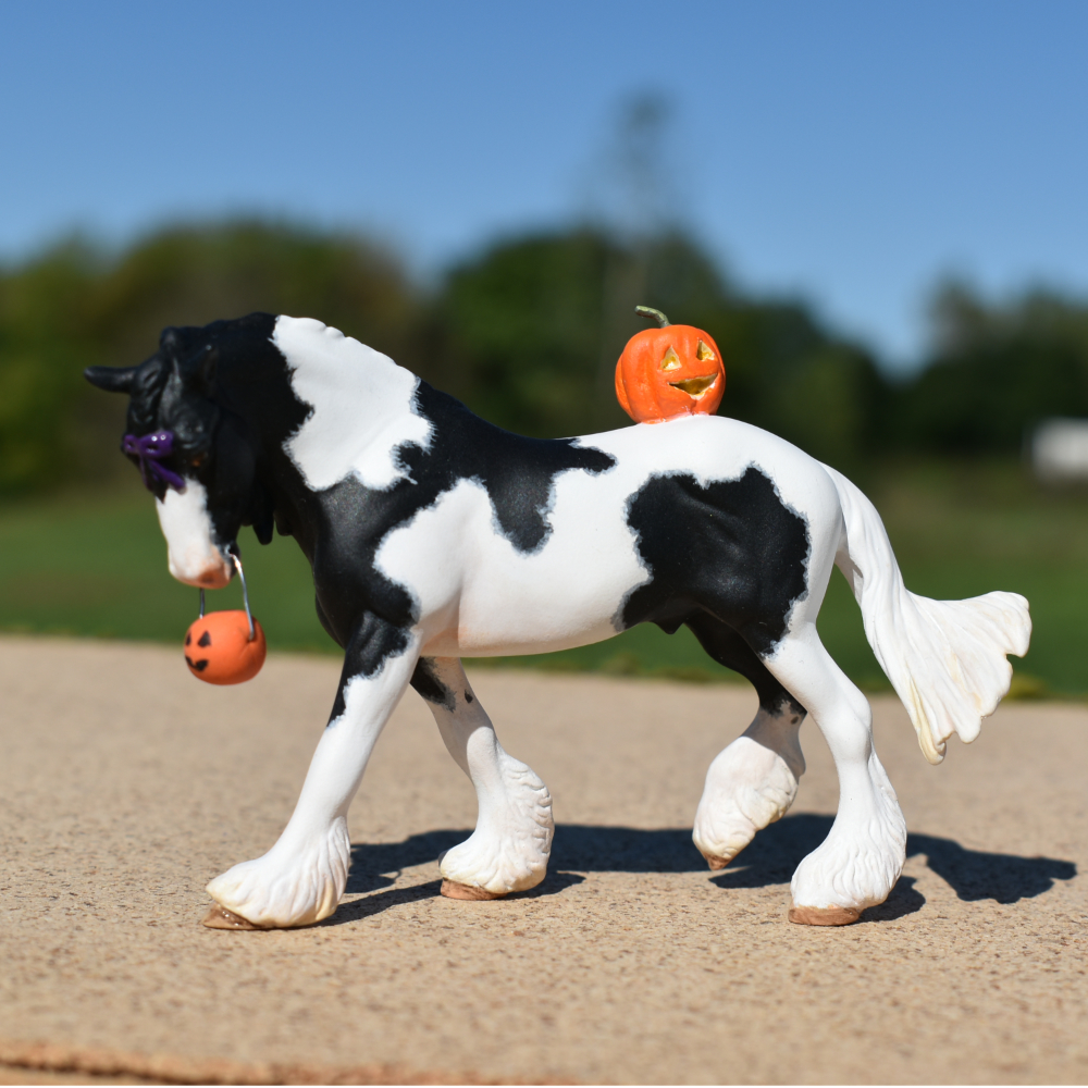 CM Breyer by Sarah Tregay, a Custom Mini/ Stablemate Model Horse to black and white pinto drum horse with purble bow and jack-o-lantern, a Halloween decorator Breyer Stablmate