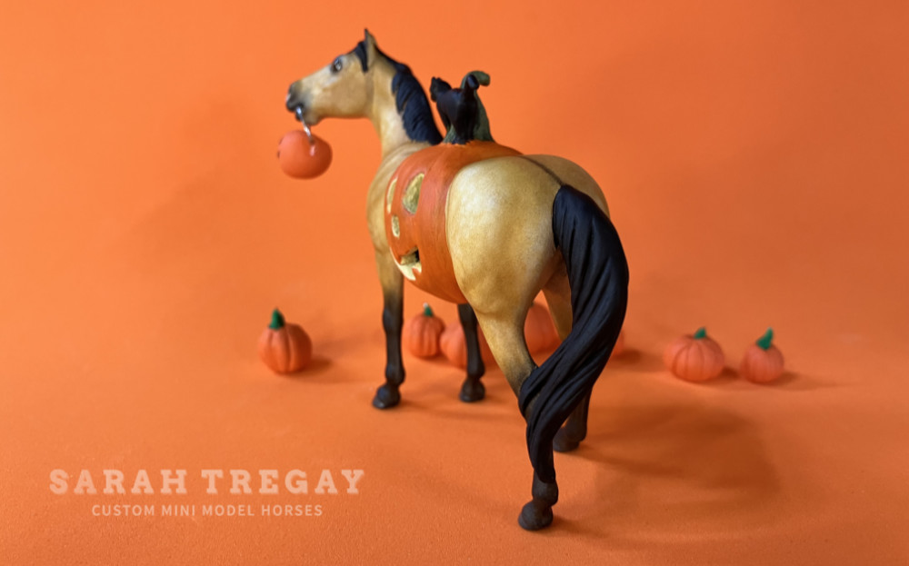Trick-or-treat, Halloween Model Horse bright dapple buckskin / Dapple buckskin QH Quarter Horse Mare, Custom Breyer Stablemate by Sarah Tregay, a Custom Mini/ Stablemate Model Horse with cat and a pumpkin belly Jack-o-lantern
