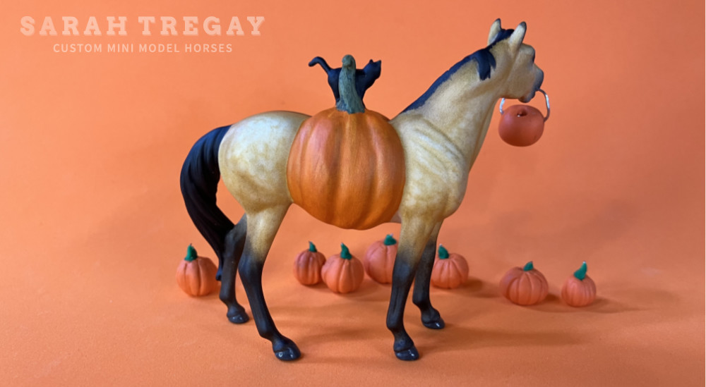 Trick-or-treat, Halloween Model Horse bright dapple buckskin / Dapple buckskin QH Quarter Horse Mare, Custom Breyer Stablemate by Sarah Tregay, a Custom Mini/ Stablemate Model Horse with cat and a pumpkin belly Jack-o-lantern