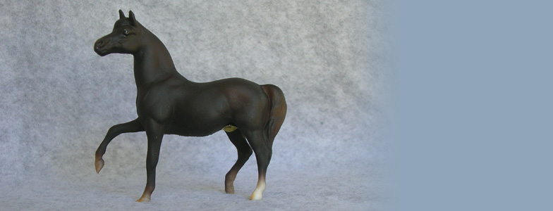 Breyer Stablemate Mold: Morgan Mare (G1) by Maureen Love, 1976, and custom mini by Sarah Tregay
